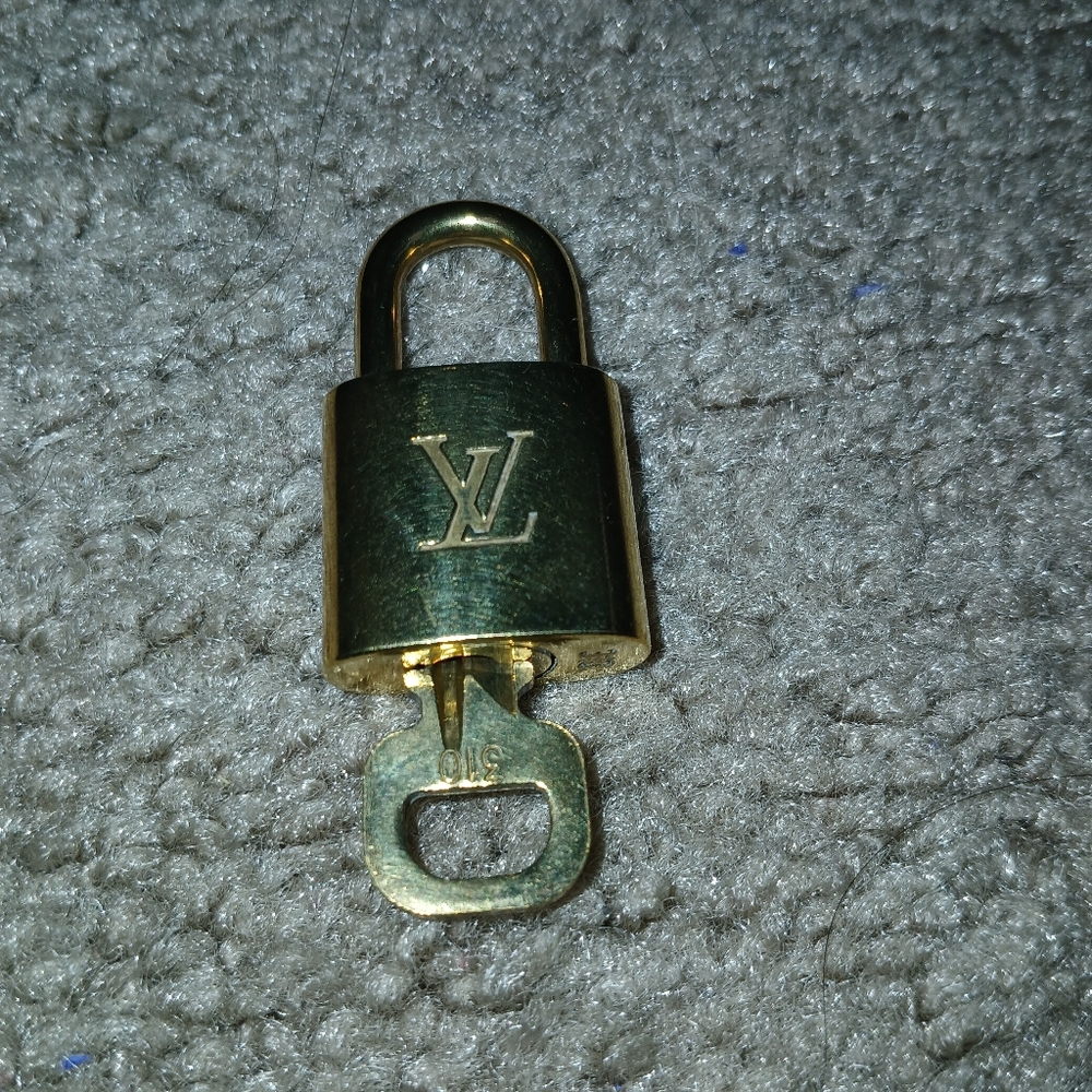 Louis Vuitton Shiny Gold Lock